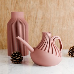 REVOLVE Watering Can